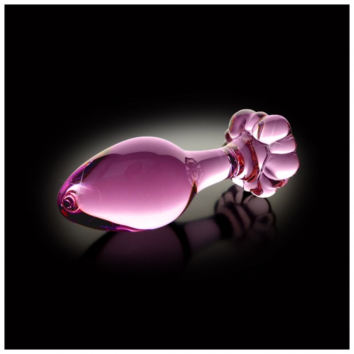 Luxus üveg anál plug átlátszó-rózsaszín színben, virág alakú alapzattal.