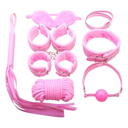Rózsaszín, 7 részes, szexuális segédeszközöket tartalmazó BDSM szett.