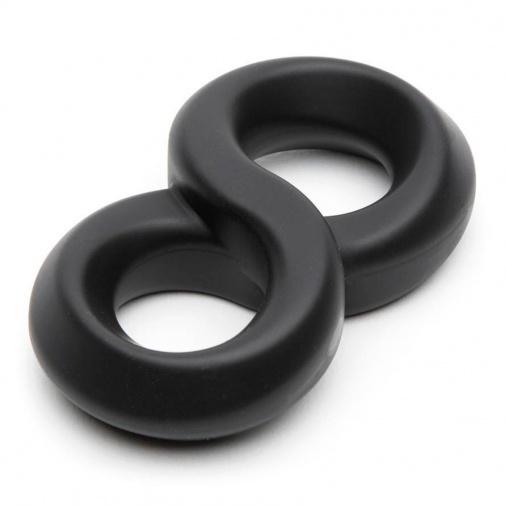 Fekete színű, nyolcas alakú szilikon péniszgyűrű.